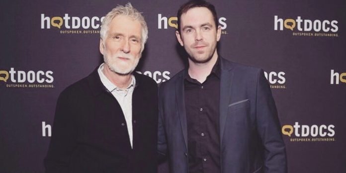 Robbie Delano (right) with Assholes: A Theory director John Walker (left) at Hot Docs.