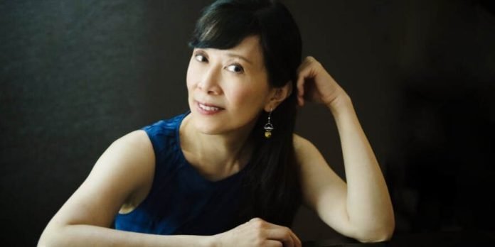 “As a Chinese-Canadian composer, I am truly thrilled to create a new composition that shares the beauty and wonders drawn from my own rich cultural heritage. Through this new work, I wish to bring the audience new sounds and ideas, as well as an inspirational message of hope and resilience.” - Alice Ping Yee Ho. Photo by Bo Huang.