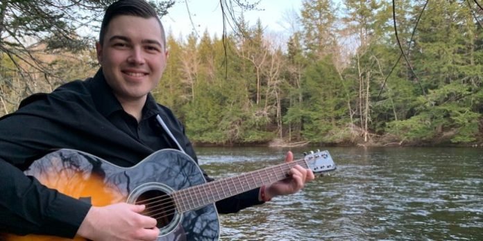 The self-taught singer-songwriter and multi-instrumentalist from St. Peter's, Cape Breton is currently based in Halifax where he is completing a master's degree in forensic psychology at Saint Mary's University in addition to writing and performing his music.